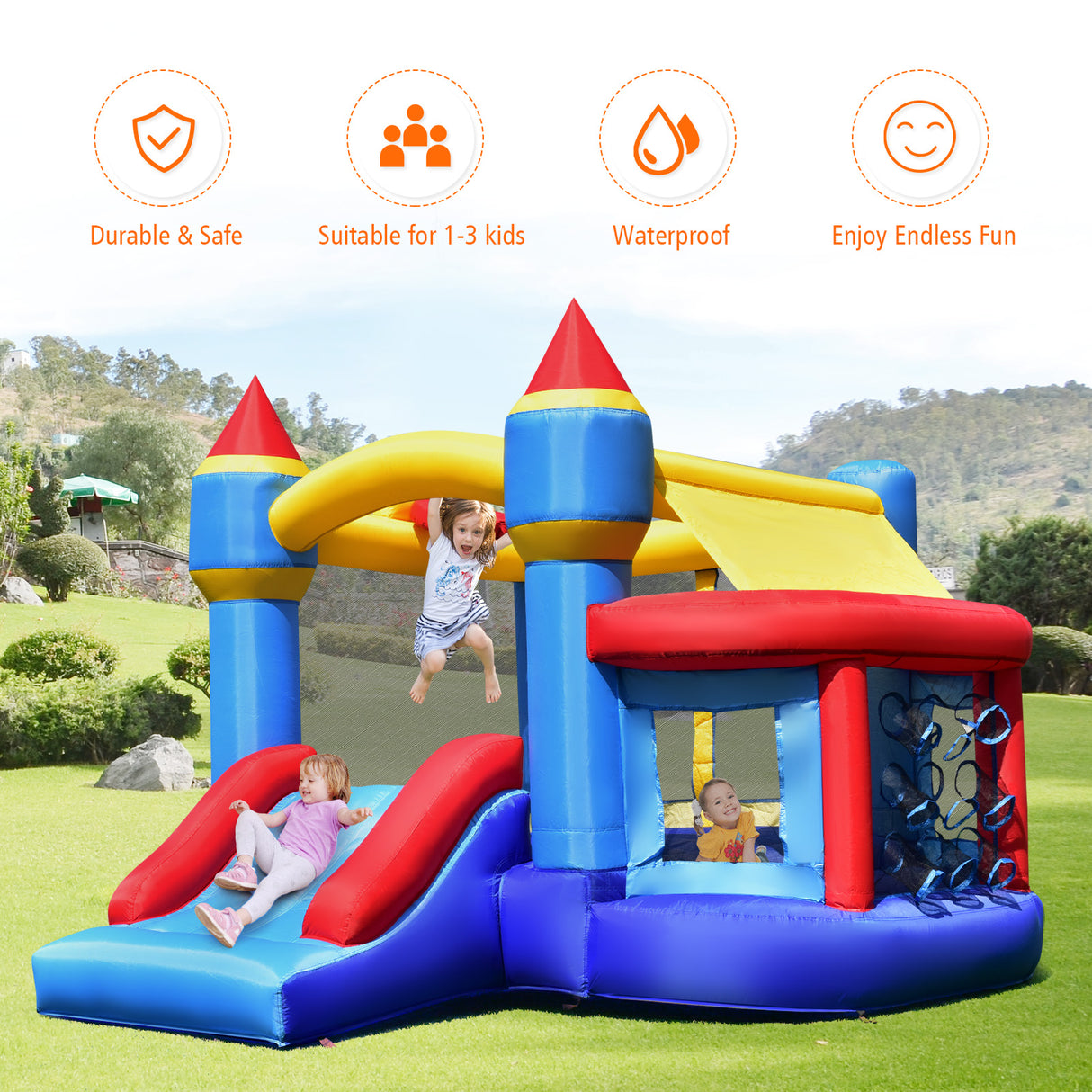 Colorful inflatable castle with slide and climbing wall on grassy area, children playing.
