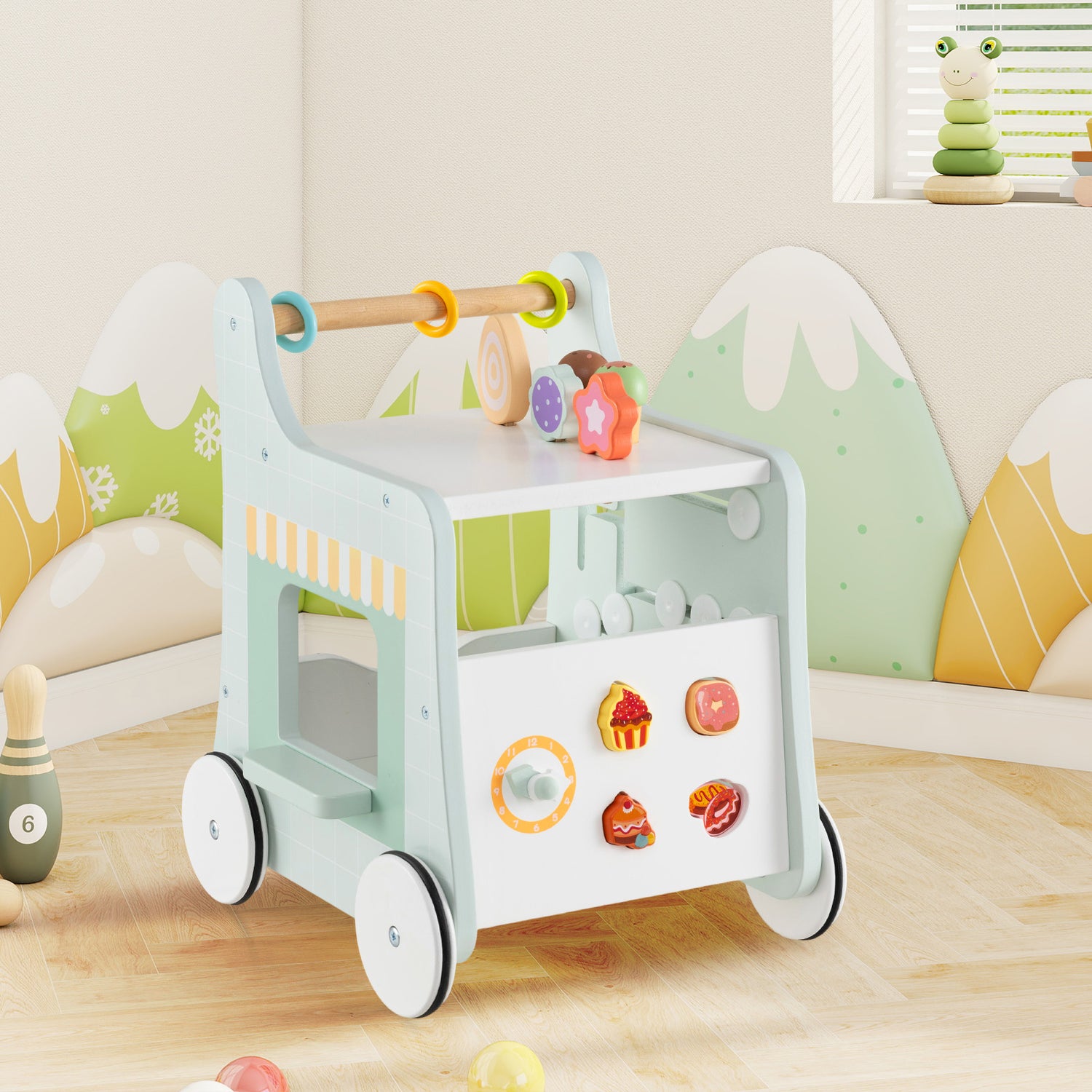 Children's toy cart with various educational toys in a playroom setting