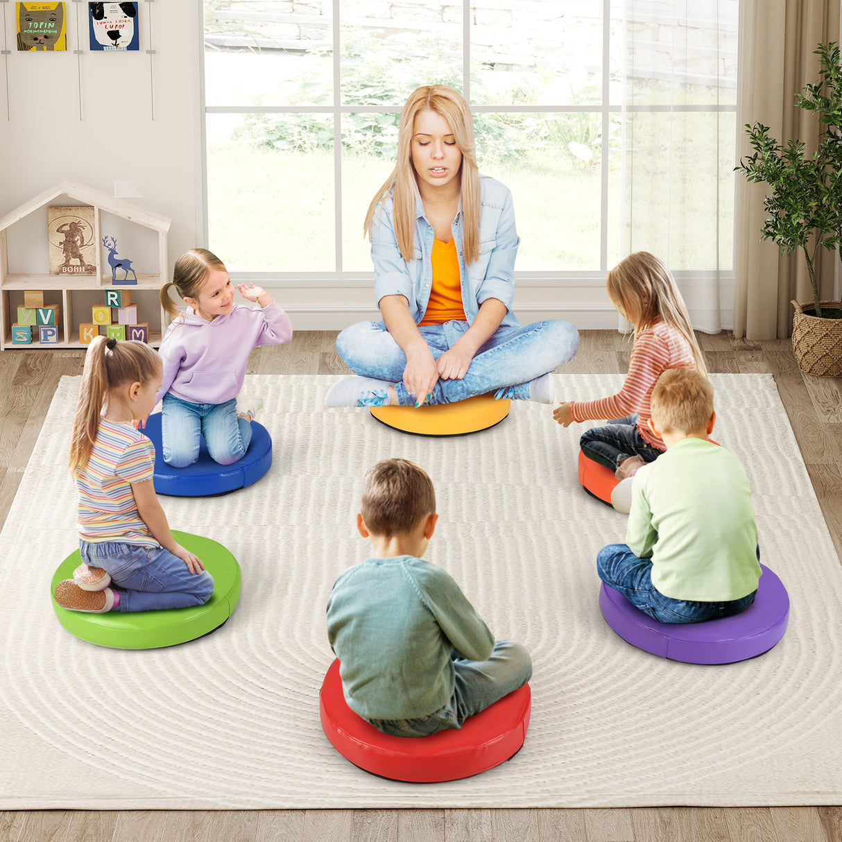 Teacher with children using colorful cushioned chairs in a classroom setting