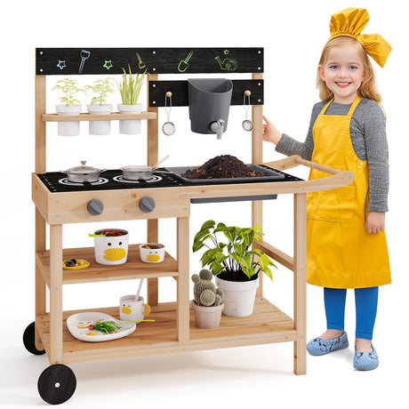 Child playing with a wooden play kitchen set on a white background