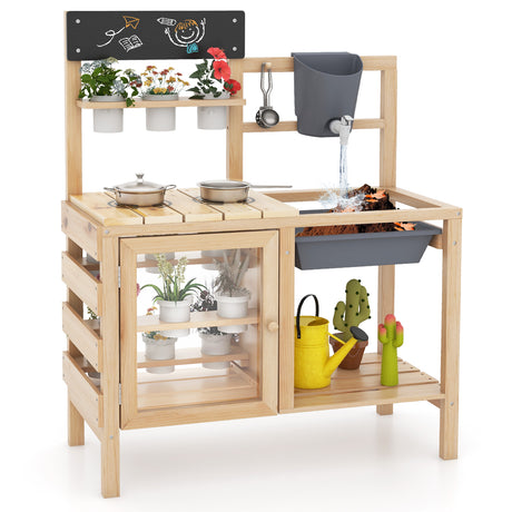 Wooden play kitchen set with various accessories on a white background