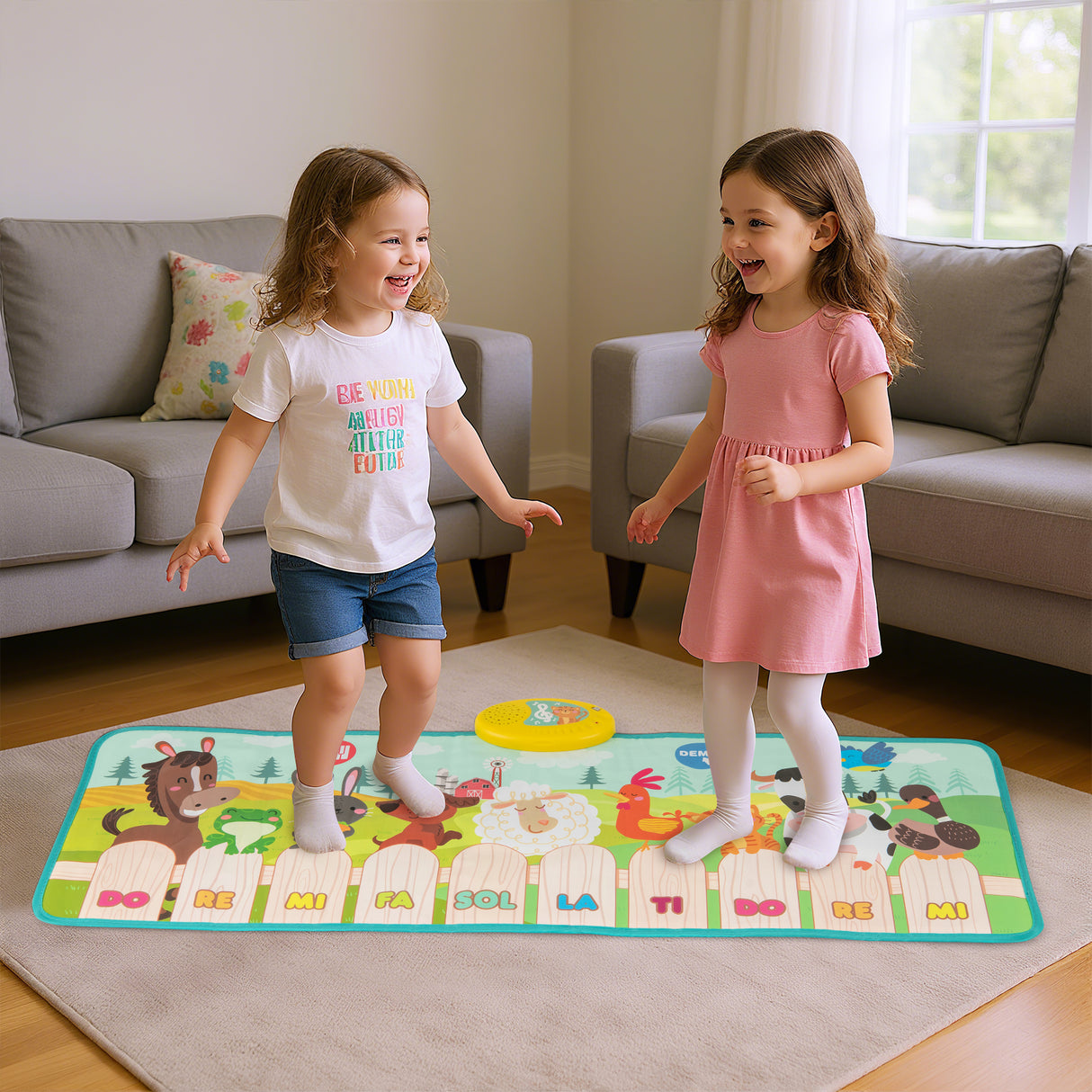 Two children playing on a colorful music mat in a living room.