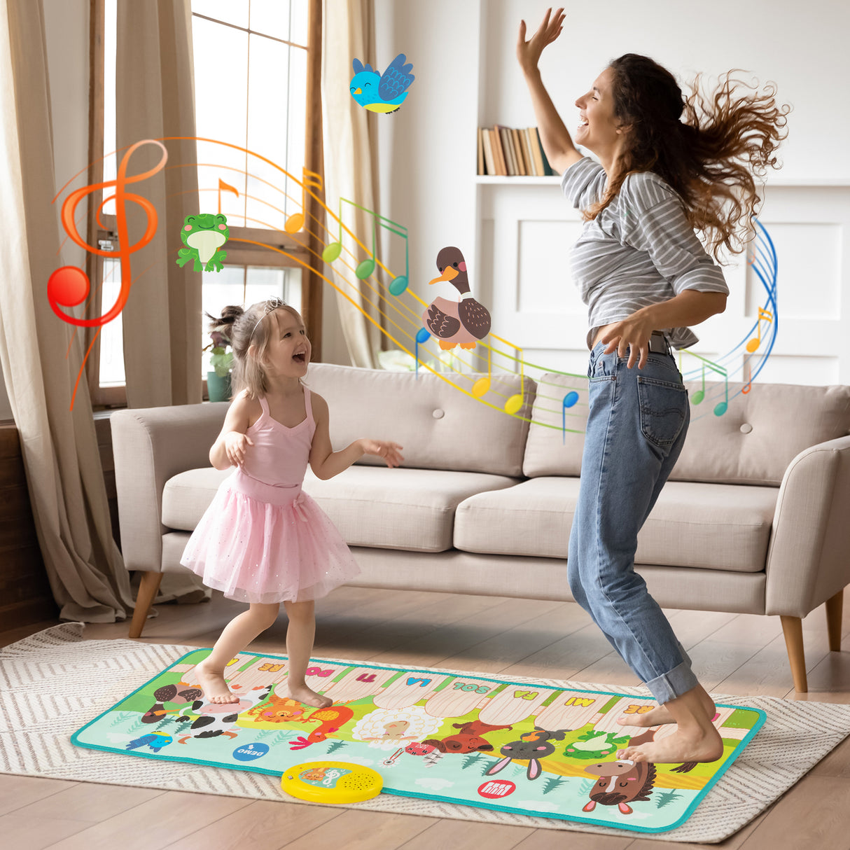 Woman and child playing on a music mat in a living room