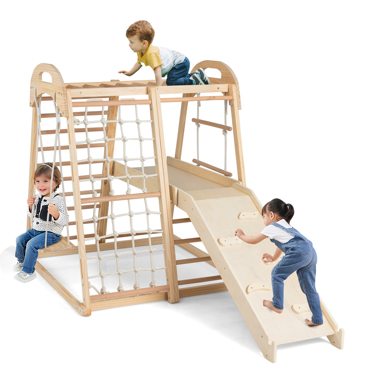 Children playing on a wooden play structure with a slide and climbing elements.