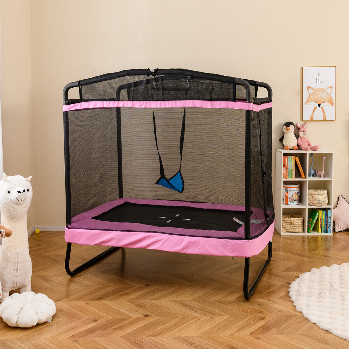 Children's trampoline with pink border in a room setting