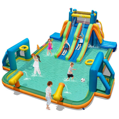 Children playing on a large multicolored inflatable water slide with dual slides and climbing walls.
