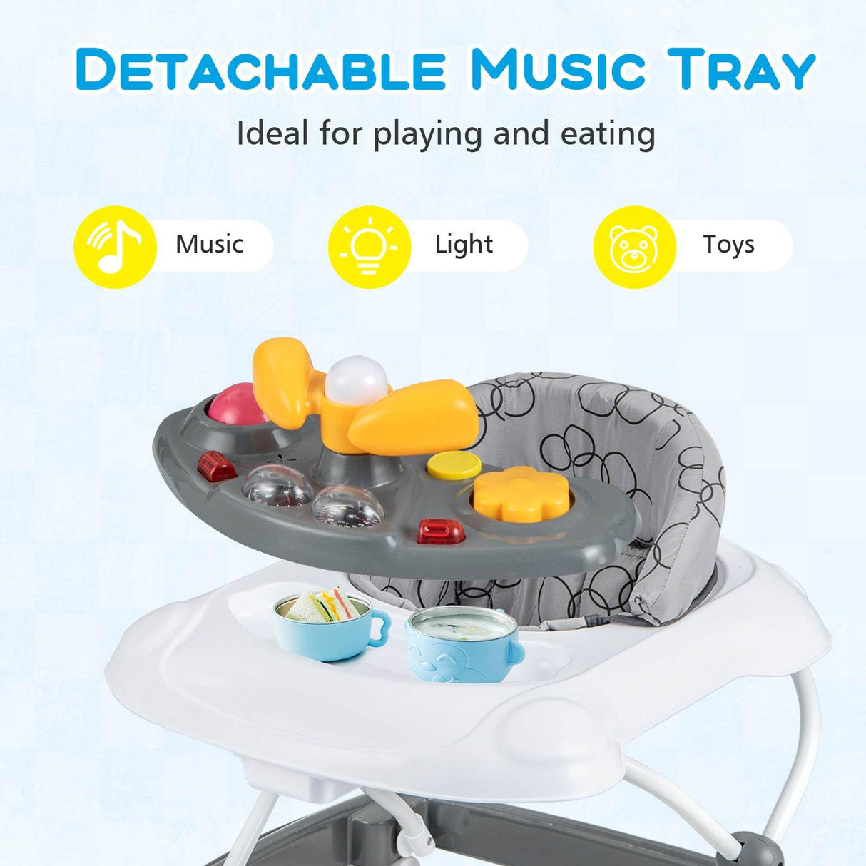 Detachable music tray with toys, lights, and music on a white background