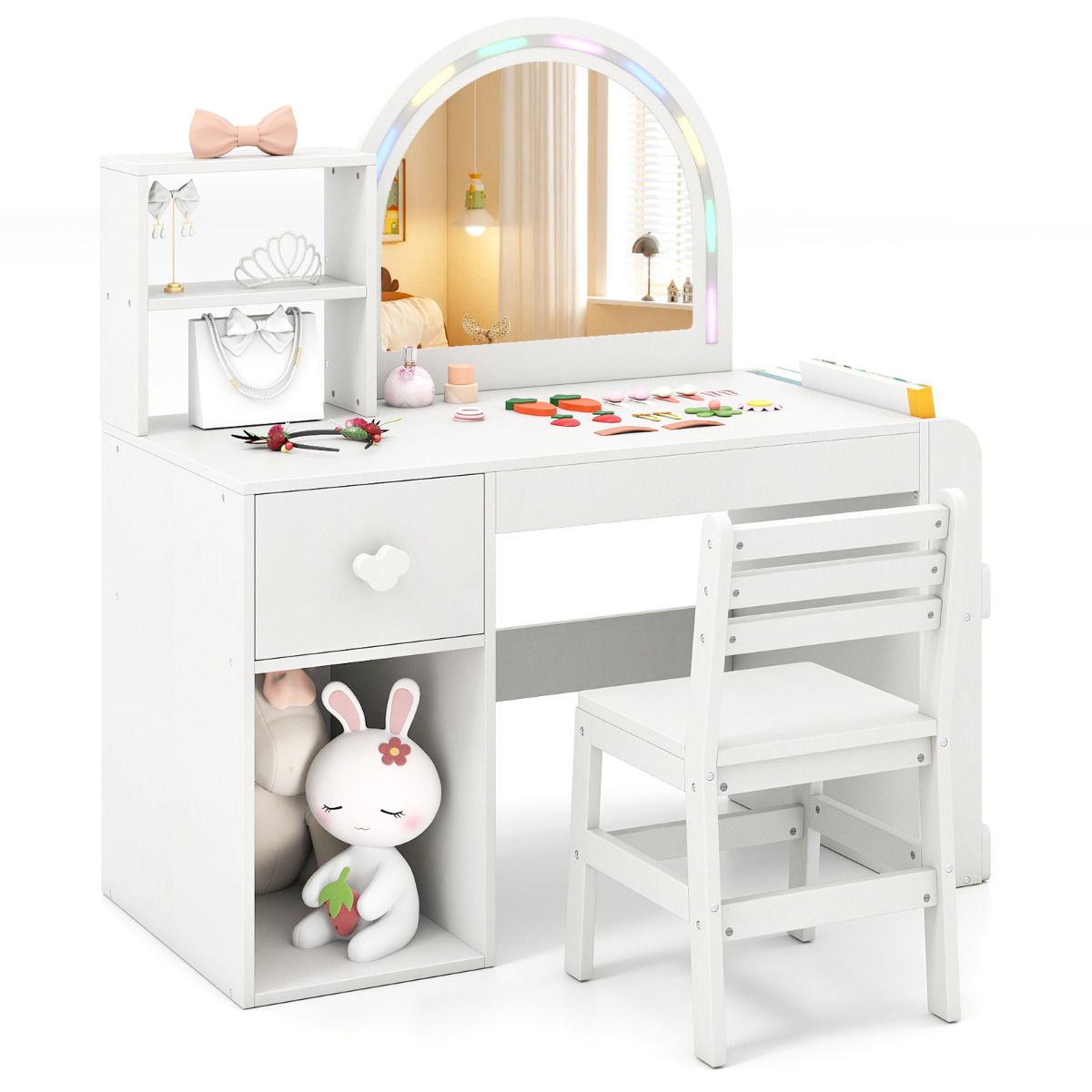 White children's vanity table with mirror, chair, and various items on a white background