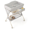 Grey baby changing table with a teddy bear on a white background