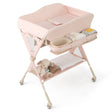 Pink baby changing table with a teddy bear on a white background