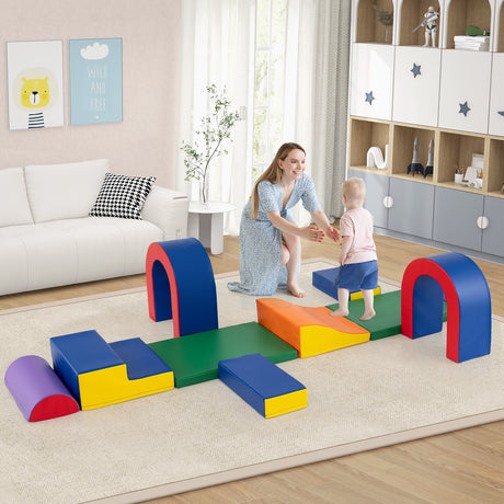 Woman and child playing with colorful play structure in a living room.