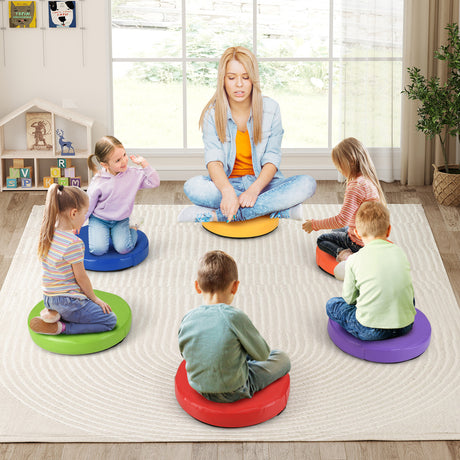 Teacher with children using colorful cushioned chairs in a classroom setting