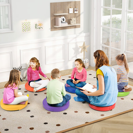 Children sitting on colorful cushions in a classroom setting