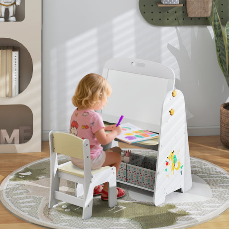 Child sitting at a small table with a white easel and coloring books in a room.