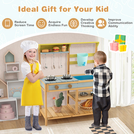 Children playing with a toy kitchen set in a room with a white curtain.