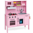 Pink toy kitchen set with various accessories on a white background