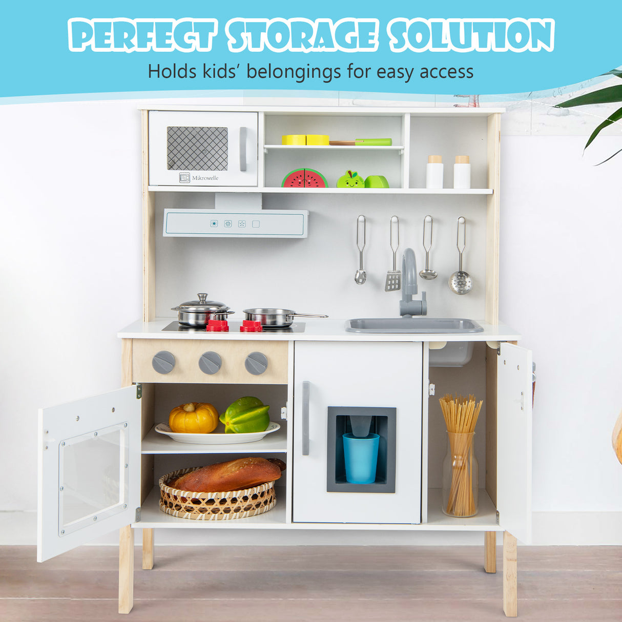 Children's play kitchen set with various accessories on a white background