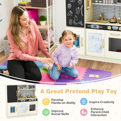 Woman and child playing with a toy kitchen set on a mat.
