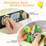 Toy kitchen set with digital clock, faucet, and toy vegetables on a white background