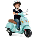Child sitting on a toy scooter with a helmet on a white background