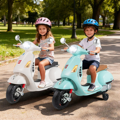 Two children on toy motorcycles in a park