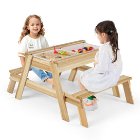 Two children playing at a wooden play table with sand and water components on a white background.