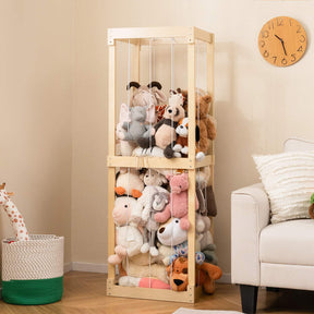 A large wooden stuffed animal storage organizer with an open top and elastic cords, filled with various plush toys, placed in a room near a wall clock and a white chair.
