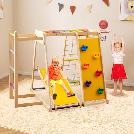 Children playing on a colorful play structure indoors