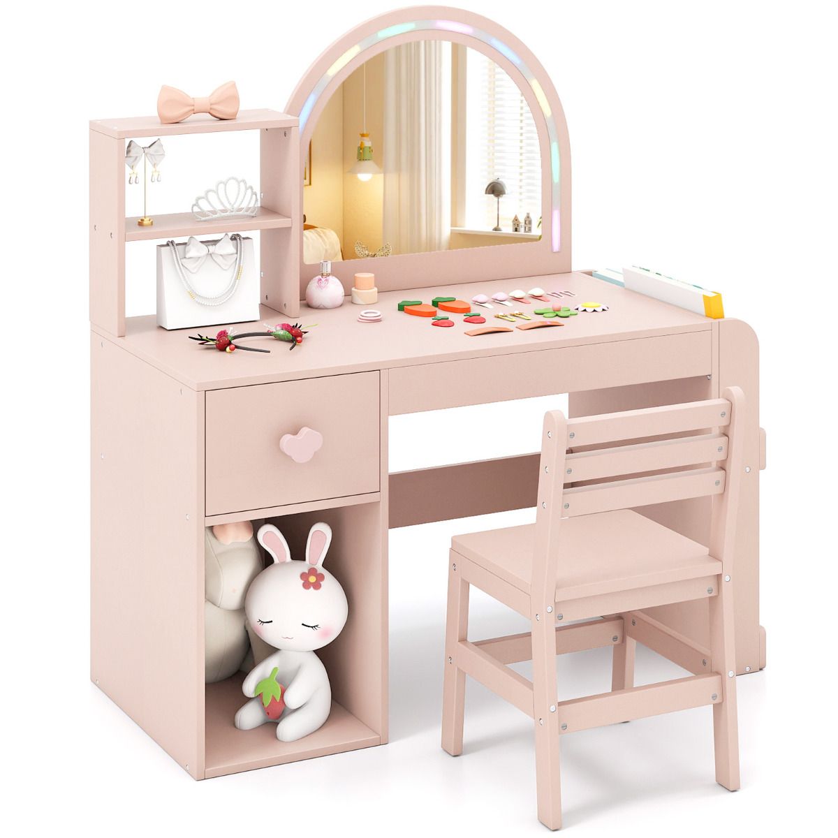 Children's vanity table with mirror, shelves, and chair on a white background