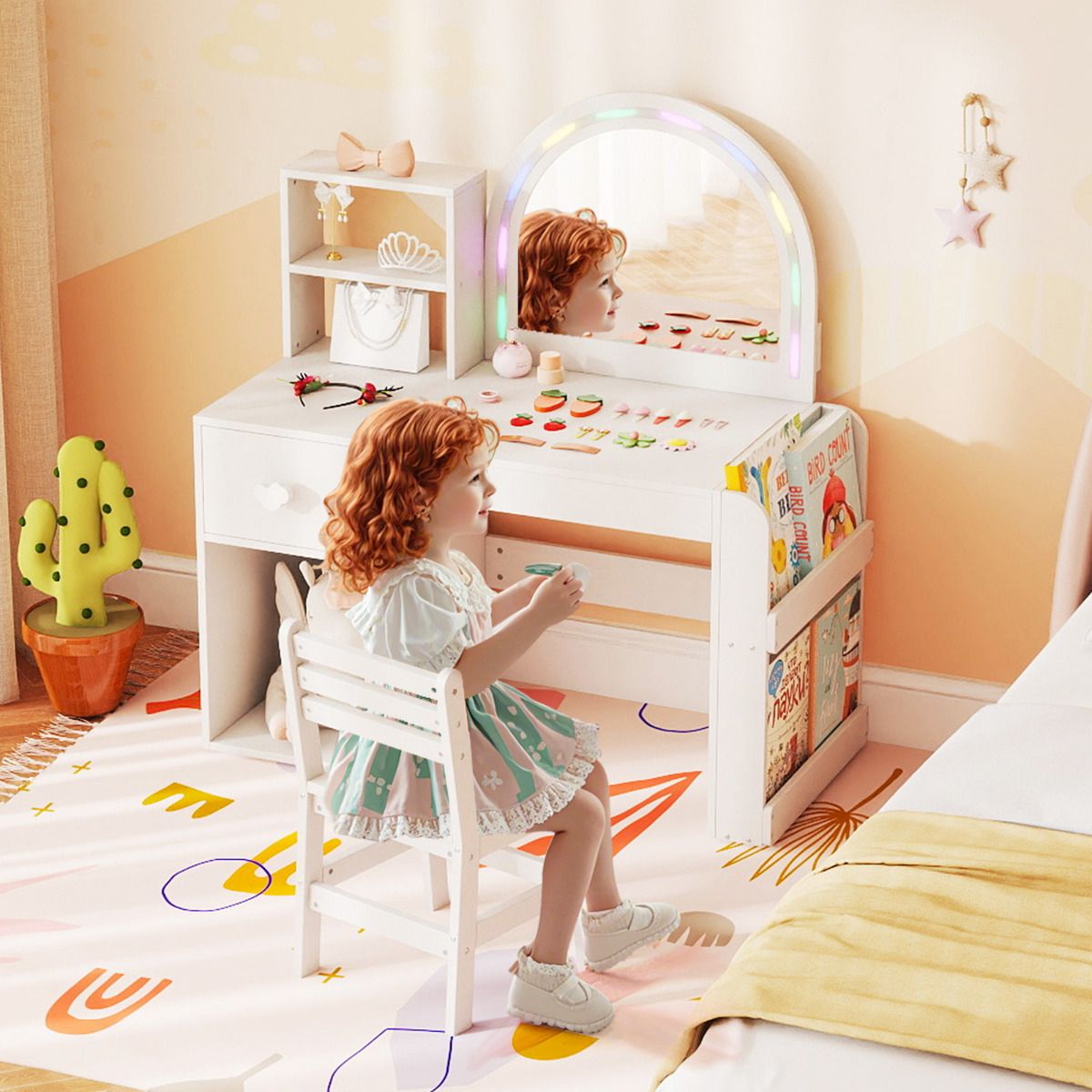 Child sitting at a small vanity table with mirror and toys in a child's room.